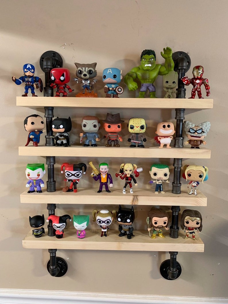 il_794xN.1904749303_ns1c.jpg Premium Tiered Display Shelf for Collectible Figures - Image 1